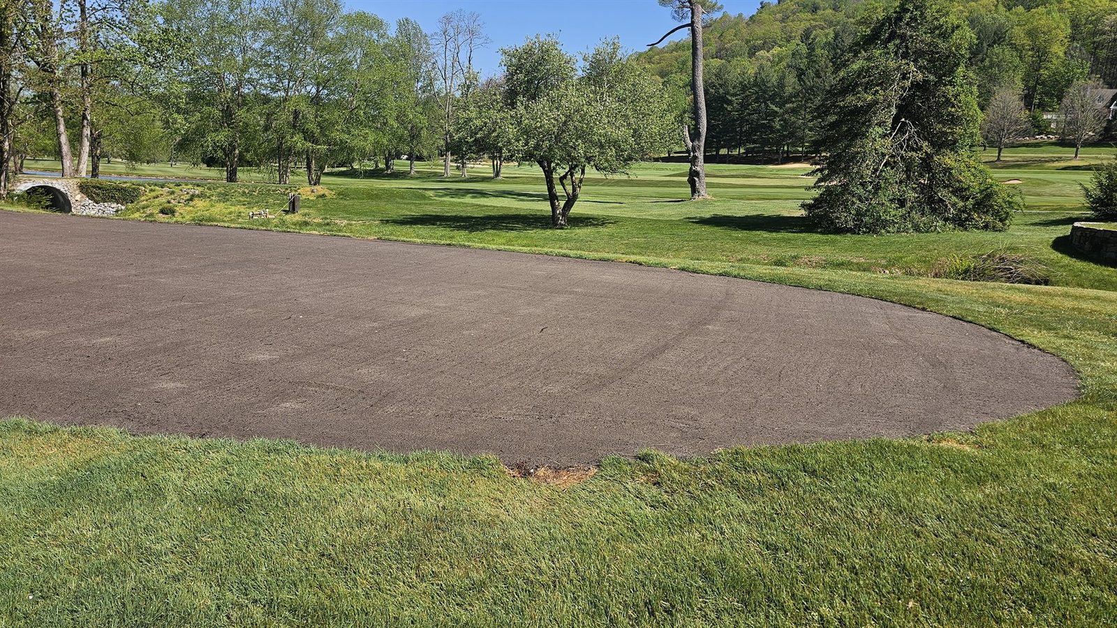 Prepared bare seedbed on Kenmure 9 tee before grow-in
